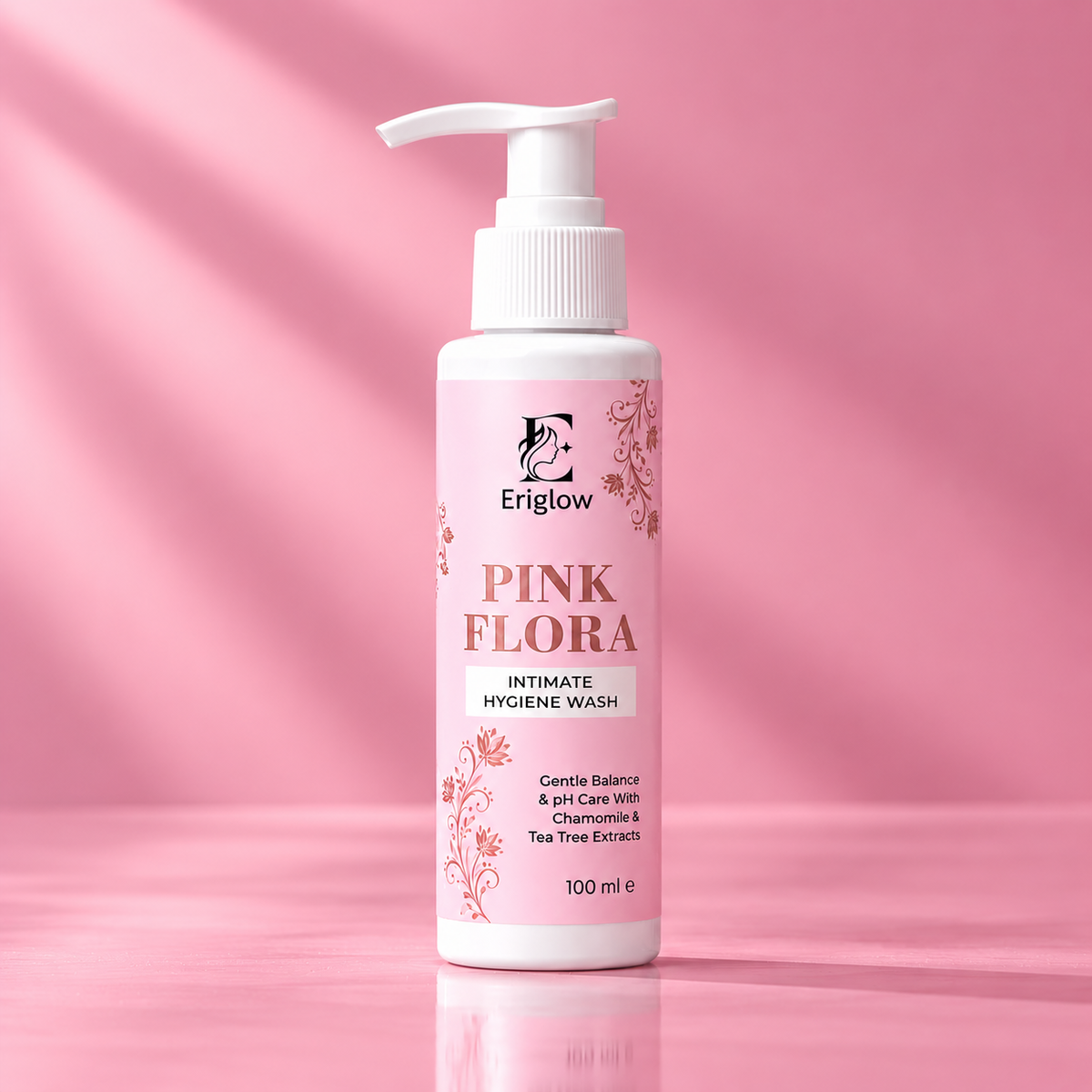 Eriglow Pink Flora Intimate Hygiene Wash 100 ml pump bottle with pink label on a pink background