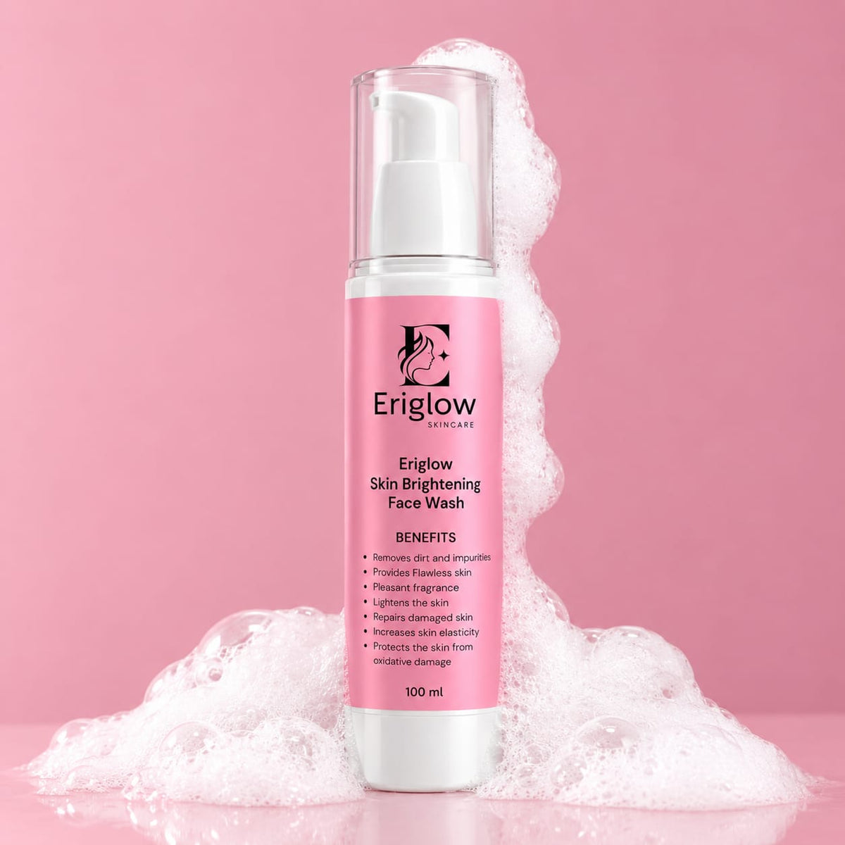 Eriglow Skin Brightening Face Wash bottle with pink label and white foam on a pink background
